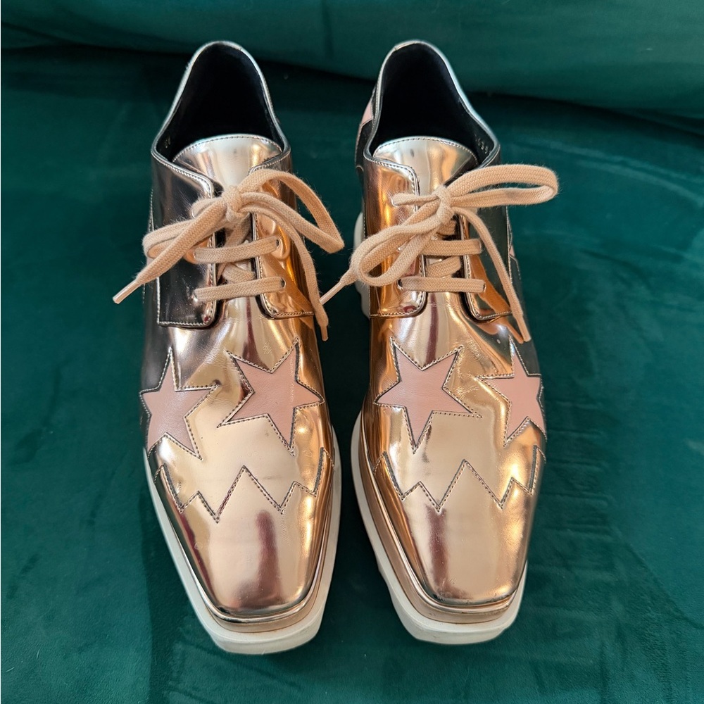Stella McCartney Elyse Star platform oxford shoes in a rose gold metallic finish